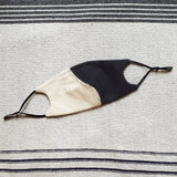 SERA GHADAKI unisex cotton masks with yin yang curved contour detail and adjustable straps. Sustainably made to order.